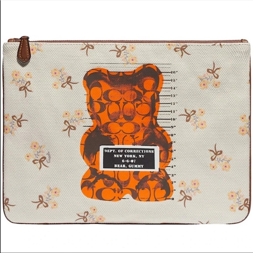 Coach Cream Floral Canvas Wristlet with Orange Gummy Bear Graphic